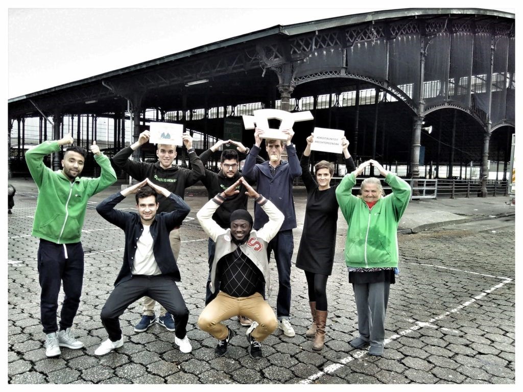 Neem een foto met een symbolisch dak boven je hoofd!